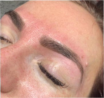 Close-up of a shaped and tinted brow
